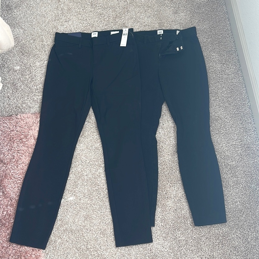 2 pairs of gap black signature skinny ankle pants. 1 pair new with tags size 0